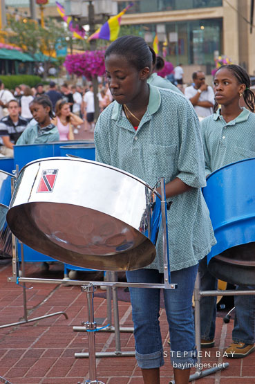 Girl playing steel drums. Baltimore, Maryland, USA.