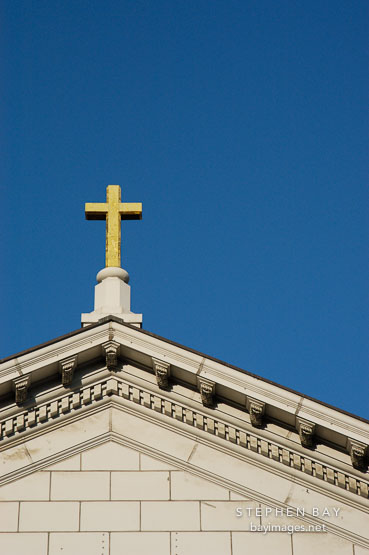 Golden cross on top of St. Joseph's Cathedral (Cathedral Basilica of St. Joseph). San Jose, California, USA.
