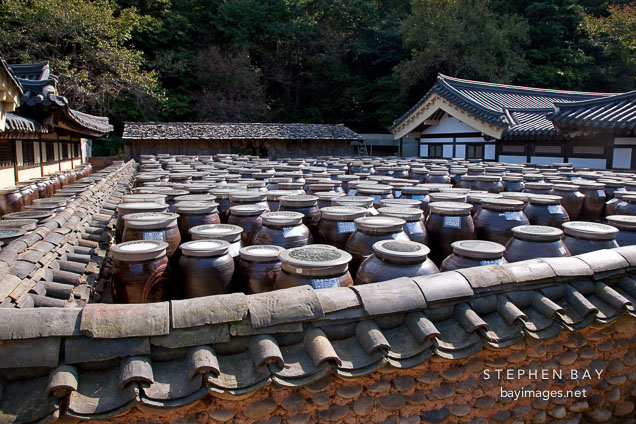 Hundreds of soybean paste jars (Doenjang) fill a courtyard at the Korean Folk Village in Yong-in City.