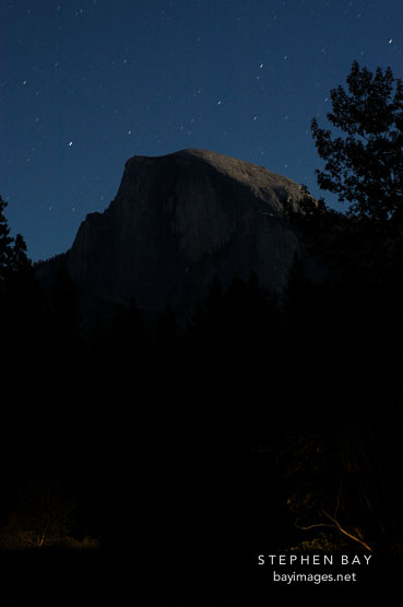 Half Dome under moonlight. Yosemite National Park, California, USA.
