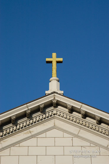 Golden cross on top of St. Joseph's Cathedral (Cathedral Basilica of St. Joseph). San Jose, California, USA.
