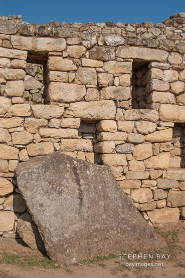Building wall with several windows. Machu Picchu, Peru.