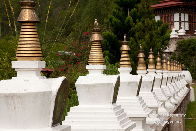 Row of chortens at Khamsum Yuelley Namgyal Chorten. Punakha Valley, Bhutan.