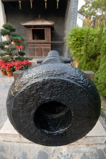Close-up of cannon. Kowloon walled city park. Hong Kong.