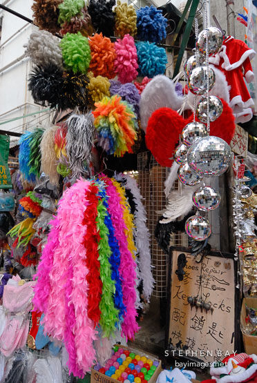 Colorful wigs and boas for sale on Pottinger Street. Hong Kong