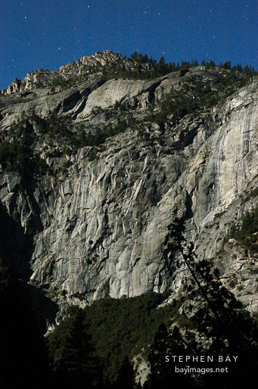 Valley wall under moonlight. Yosemite National Park, California, USA.