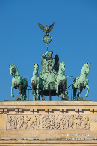 Quadriga, the goddess of victory driving a four horse chariot. Brandenburg Gate, Berlin, Germany.