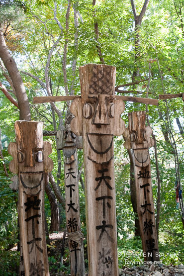 The Korean Folk Village in South Korea is guarded by this forest of jangseung, or spirit sticks. The jangseung were worshipped as minor gods.