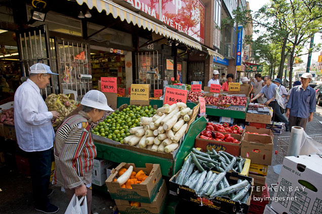 Buying produce in Chinatown markets. Toronto, Canada.