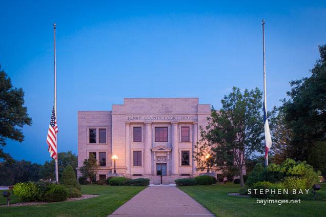 Henry County Courthouse with flags at half mast. Mount Pleasant, Iowa.