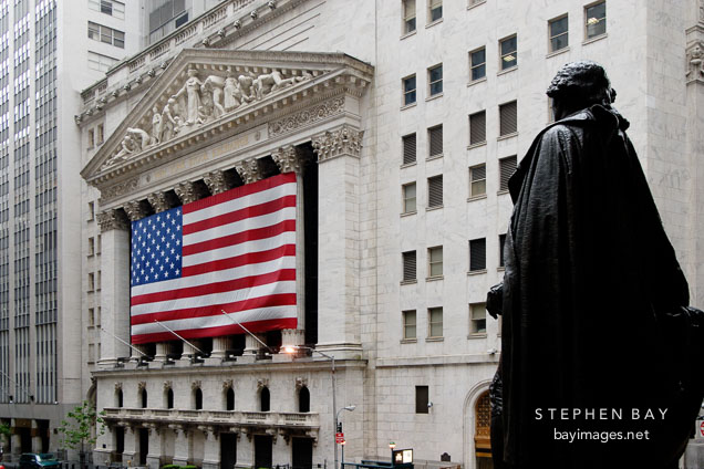 New York Stock Exchange and statue of George Washington. New York City, New York, USA.