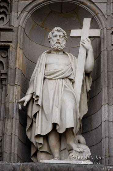 Statue of man holding cross. Lima Cathedral, Peru.