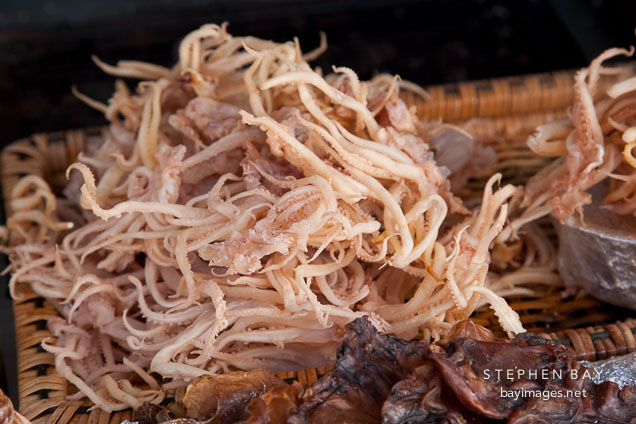 Ojingeo (dried squid) is popular at sidewalk stands in Korea.