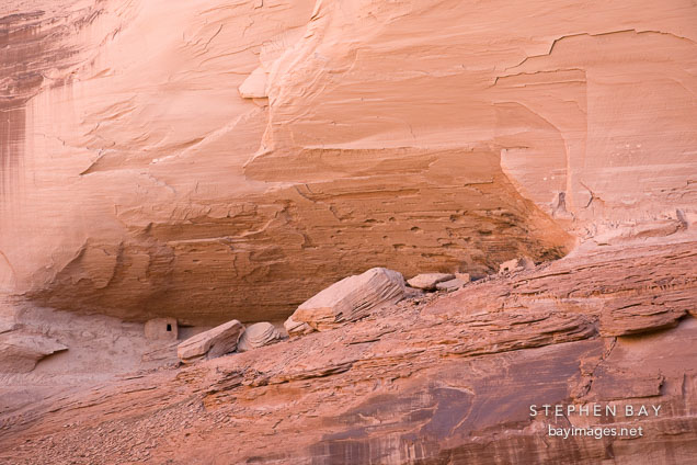 A small dwelling is hidden in the alcove at Ledge Ruin. Canyon de Chelly, Arizona.
