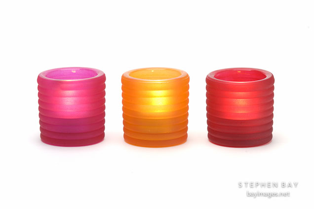 Tealight holders with candles.