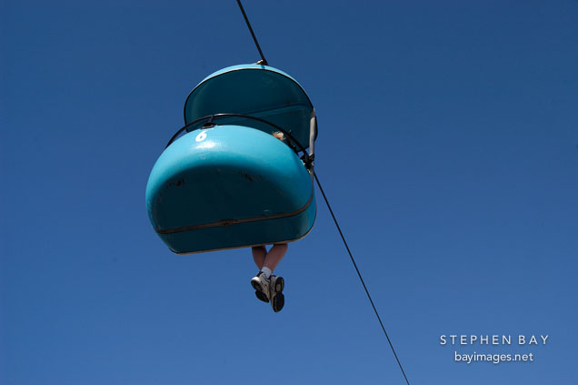 Dangling feet on a cable car ride. Santa Cruz, California, USA.