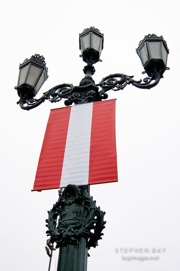 Street lamp and Peruvian flag. Lima centro, Peru.
