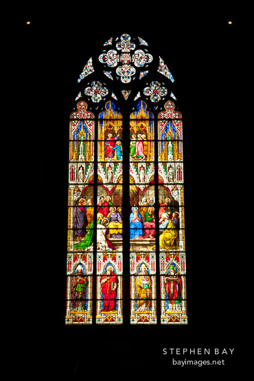 Colorful stained glass windows in the Cologne Cathedral. Cologne, Germany.