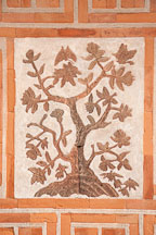 Gyeongbok Palace in Seoul, South Korea features beautiful brick and clay work, such as this image of a tree. - Photo #21022