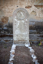 Tombstone of Old Gabriel, a native american who allegedly lived 151 years old. Carmel Mission, California. - Photo #26824
