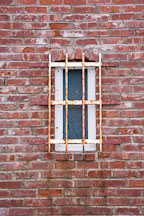 Barred window and brick wall. Santa Cruz Lighthouse, California. - Photo #19525
