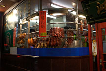 Duck and pork meat hanging in the window of chinatown restaurant, Melbourne, Australia. - Photo #1529