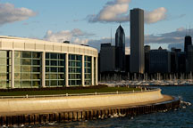 Glass windows of the Shedd Aquarium reflect the warm morning light of sunrise. Chicago, Illinois, USA. - Photo #10703