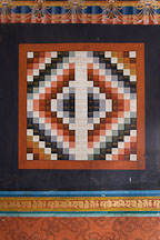 Poem set in a square geometric design dedicated to the Shabdrung Ngawang Namgyel. Punakha, Bhutan. - Photo #23430
