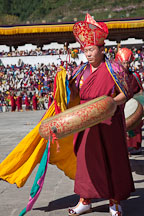 Monk holding large drum. Thimphu tsechu, Bhutan. - Photo #22432