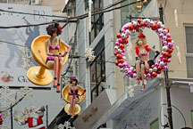 Mannequins hanging in glasses. Lan Kwai Fong, Hong Kong, China - Photo #15034