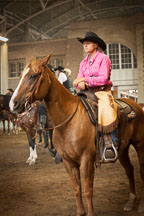 Young woman waits her turn at the cowboy mounted shooting contest. Iowa State Fair, Des Moines. - Photo #33034