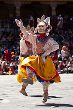 White skull mask on dancer. Thimphu tsechu, Bhutan. - Photo #22535