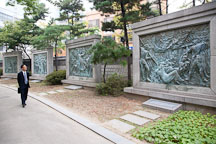 Tapgol Park in Seoul, South Korea, is lined with copperplate relief etchings showing the history of the March 1st Movement for independence that began there in 1919. - Photo #21137