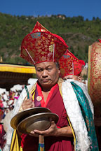 Monk clashing large cymbals. Thimphu tsechu, Bhutan. - Photo #22439
