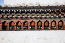 Prayer wheels on the Chorten Lhakhang. Paro, Bhutan. - Photo #24339