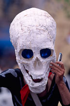 Giant skull answering a call. Carnaval's grand parade, San Francisco. - Photo #1140