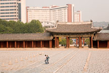 Visitors walk through the courtyard of Changgyeong Palace in Seoul, South Korea. - Photo #21343