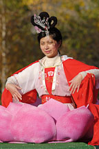 Asian woman in flower blossom. San Jose Holiday Parade. San Jose, California, USA. - Photo #5148