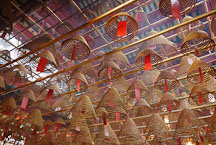 Hundreds of incense coils hang from the temple ceiling. Man Mo Temple, Hong Kong, China. - Photo #15149