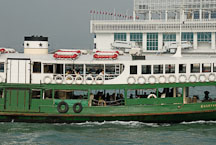 Star Ferry pulling into Kowloon Pier. Hong Kong, China - Photo #15305
