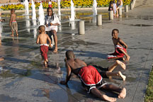 Kids playing in the fountains at Cesar de Chavez park. San Jose, California, USA. - Photo #4850