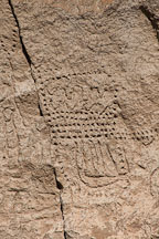 Petroglyphs carved into rock wall. Petroglyph Point, California. - Photo #27251