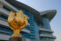 Golden Bauhinia statue in front of the Hong Kong Convention center. Hong Kong, China. - Photo #14554