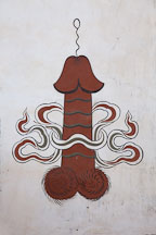 Side of a house with a painting of a penis. Sopsokha, Bhutan. - Photo #23554