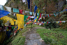 Prayer flags crossing the steps to the Tiger's Nest monastery. Paro, Bhutan. - Photo #24154