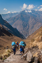 Porters carrying heavy loads up the Inca Trail. - Photo #9756