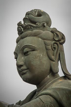 Buddhist statues praising the Tian Tan Budha. Lantau Island, Hong Kong, China. - Photo #16060