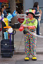 Clown making balloon animals. Third Street Promenade, Santa Monica, California, USA. - Photo #6960