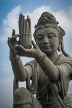 Buddhist statues praising the Tian Tan Budha. Lantau Island, Hong Kong, China. - Photo #16061