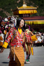 Woman singing and dancing. Thimphu tsechu, Bhutan. - Photo #22667